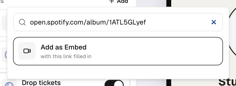 The picker with a Spotify address pasted, offering to add it as an embed